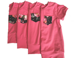 T-shirt évolutif rose à poche fleurs sur fond noir